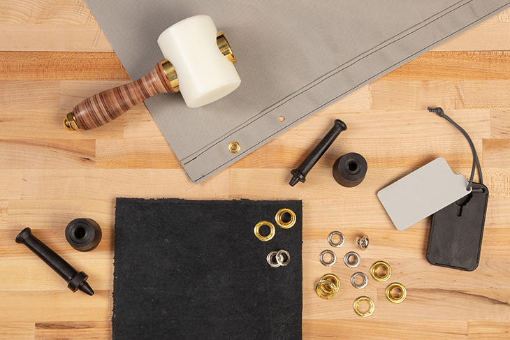 A variety of tools for installing grommets